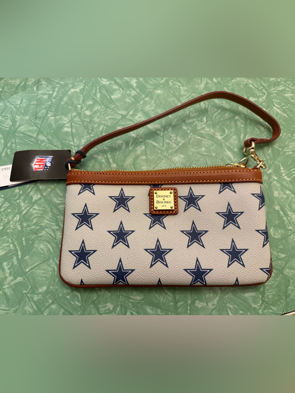 Dooney & Bourke Dallas Cowboys Cream Wristlet with Navy Star and Tan Trim